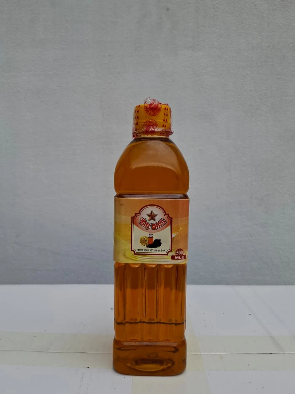 মিনার মার্কা কাঠের ঘানির খাঁটি সরিষার তেল