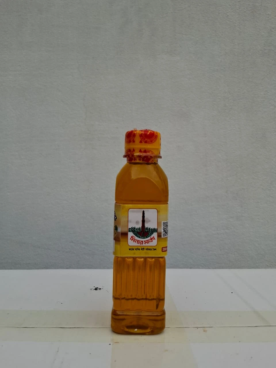 মিনার মার্কা কাঠের ঘানির খাঁটি সরিষার তেল